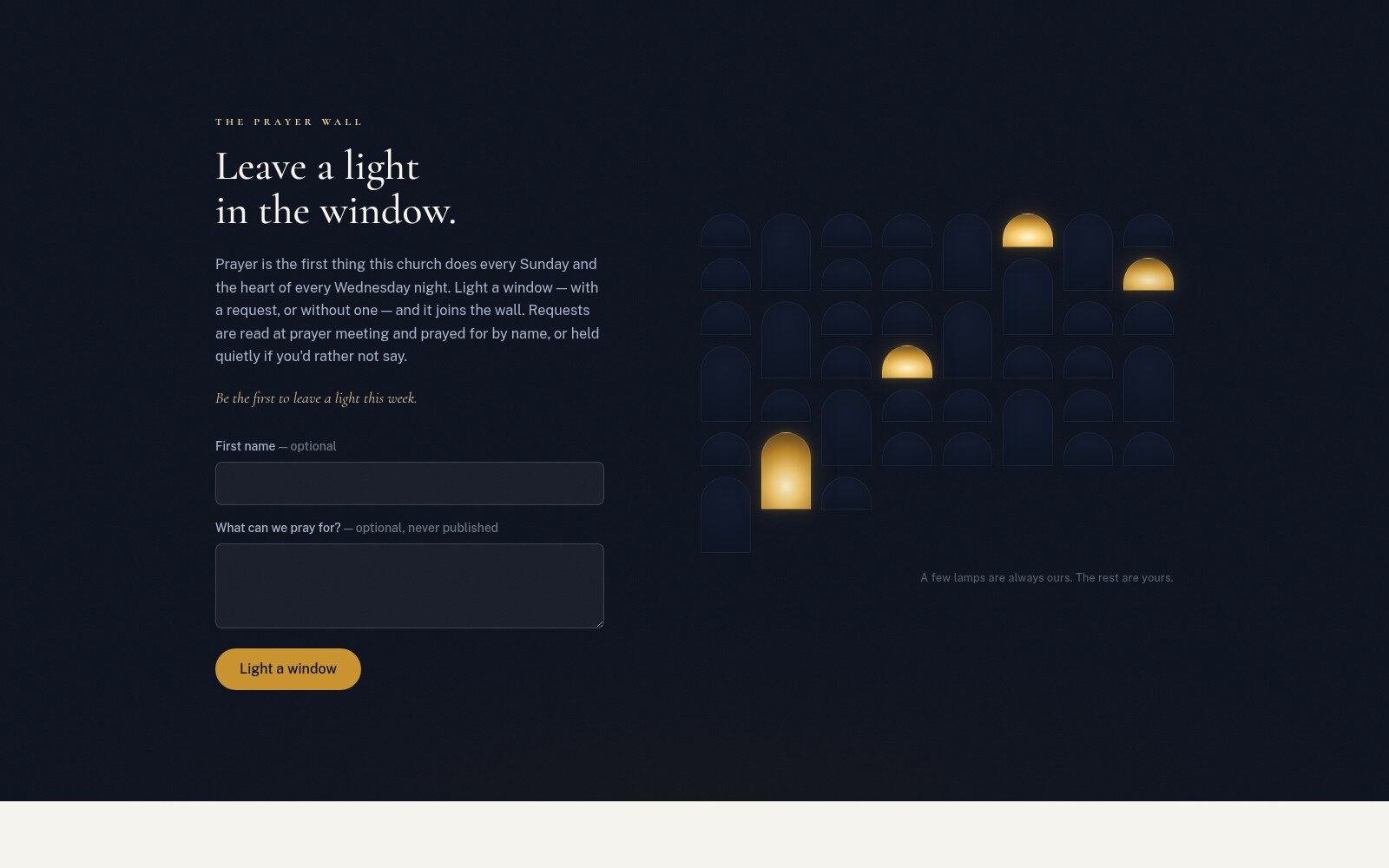 The prayer wall — a night wall of arched windows where visitors leave a light